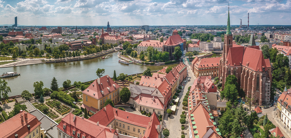 <img src="jakie-są-najlepsze-miasta"alt="panorama Wrocławia">
